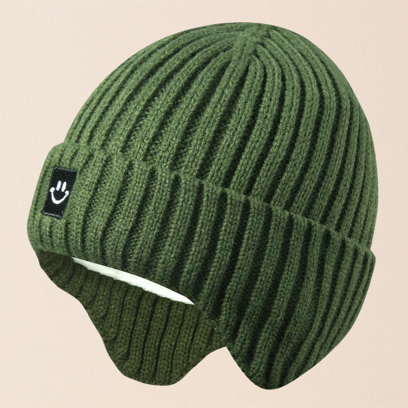 Gorro cálido de esquí con orejeras y cara sonriente para niños